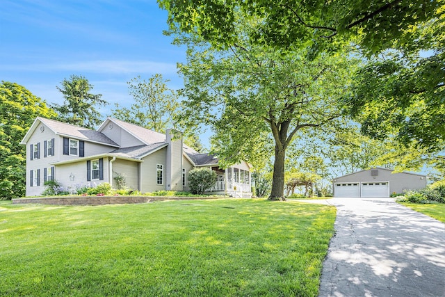 5700 Dexter Townhall Rd, Dexter, MI 48130 - view of front of home with a front lawn, a garage, and a chimney