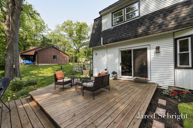 6872 Forest Valley Dr SE, Grand Rapids, MI 49546 - wooden deck featuring an outdoor hangout area and a lawn