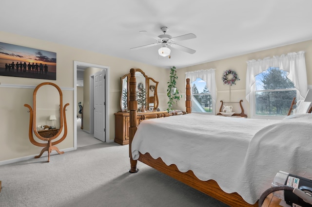 7572 S 10th St, Kalamazoo, MI 49009 - bedroom with light colored carpet, a ceiling fan, and baseboards