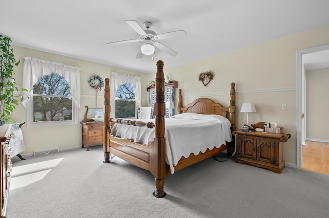 7572 S 10th St, Kalamazoo, MI 49009 - bedroom featuring light colored carpet, a ceiling fan, and baseboards