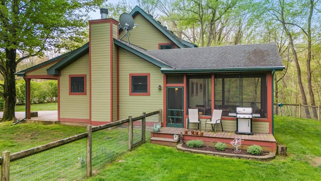 16434 S Basswood Rd, Three Oaks, MI 49128 - back of property featuring a chimney, a deck, a sunroom, and a shingled roof