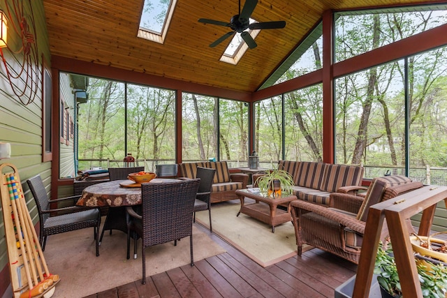 16434 S Basswood Rd, Three Oaks, MI 49128 - sunroom / solarium featuring a skylight, an outdoor living space, high vaulted ceiling, ceiling fan, and healthy amount of natural light