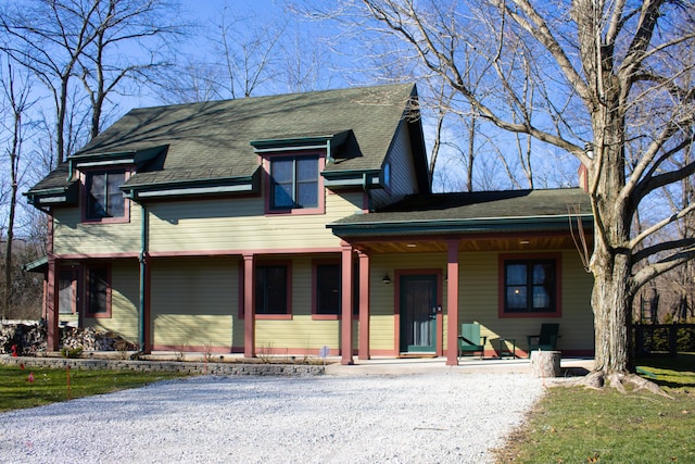 16434 S Basswood Rd, Three Oaks, MI 49128 - view of front of property with covered porch and roof with shingles