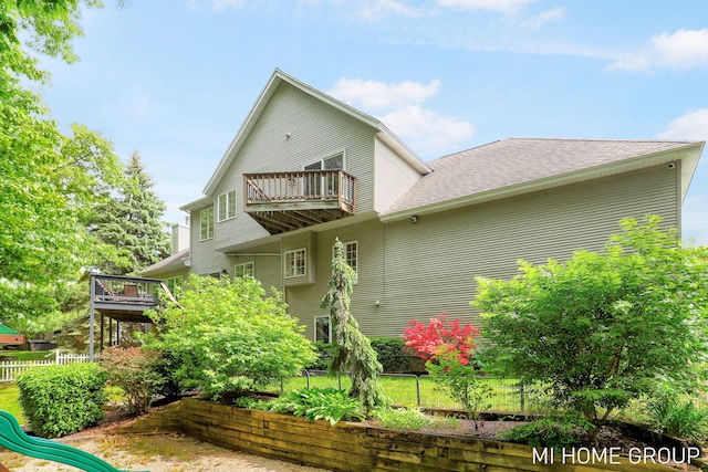 2103 Woodlark Dr, Holland, MI 49424 - back of house with a balcony