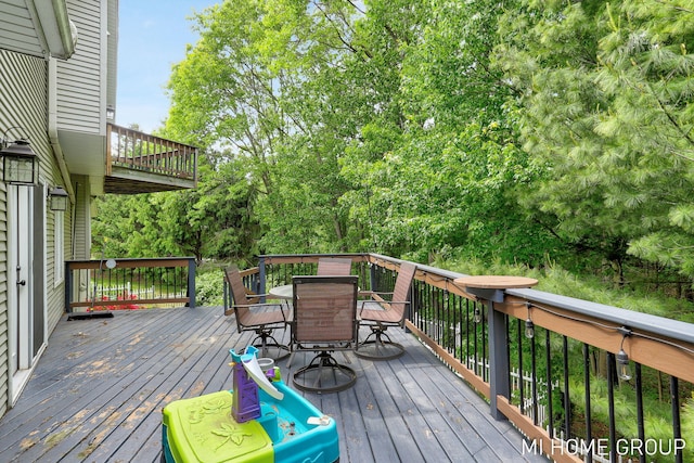 2103 Woodlark Dr, Holland, MI 49424 - wooden deck with outdoor dining space