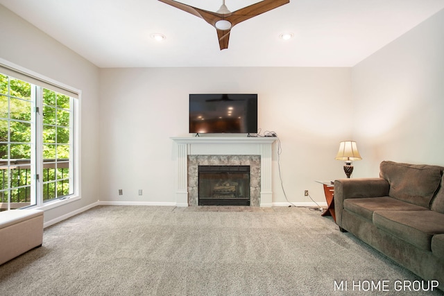 2103 Woodlark Dr, Holland, MI 49424 - living area featuring carpet floors, baseboards, healthy amount of natural light, a fireplace, and recessed lighting