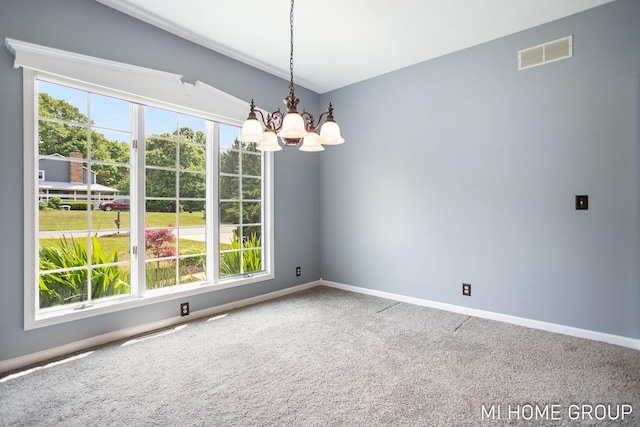 2103 Woodlark Dr, Holland, MI 49424 - carpeted empty room with a chandelier, plenty of natural light, and baseboards