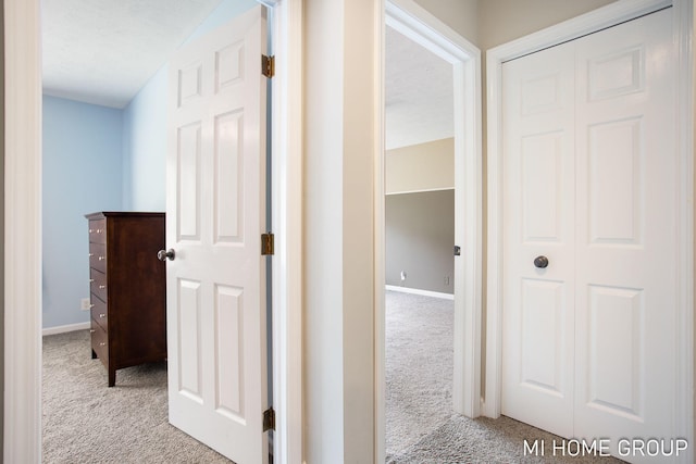 2103 Woodlark Dr, Holland, MI 49424 - hall with carpet flooring and baseboards