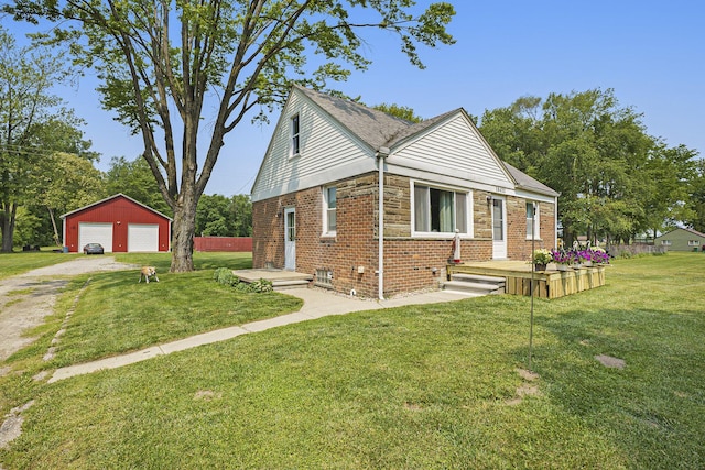 18422 Merriman Rd, Romulus, MI 48174 - view of side of property featuring a garage, driveway, an outbuilding, brick siding, and a lawn