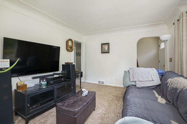 18422 Merriman Rd, Romulus, MI 48174 - carpeted living area featuring baseboards and arched walkways