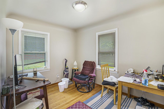 18422 Merriman Rd, Romulus, MI 48174 - home office featuring wood finished floors