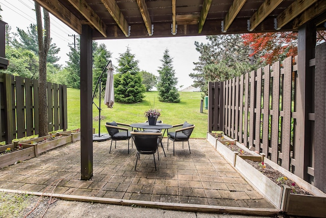 2503 Meade Ct, Ann Arbor, MI 48105 - view of patio / terrace with outdoor dining space and a vegetable garden