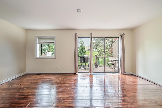 2503 Meade Ct, Ann Arbor, MI 48105 - spare room with hardwood / wood-style flooring, baseboards, and a smoke detector