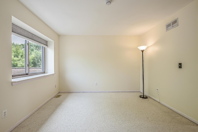 2503 Meade Ct, Ann Arbor, MI 48105 - spare room featuring baseboards and a smoke detector