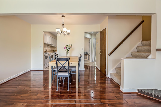 2503 Meade Ct, Ann Arbor, MI 48105 - dining space with a chandelier, dark wood-style flooring, stairway, and baseboards