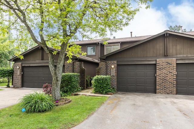 2503 Meade Ct, Ann Arbor, MI 48105 - view of front of house with brick siding and asphalt driveway