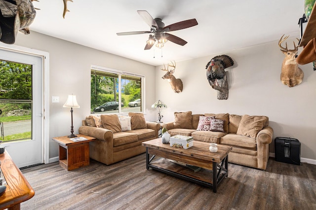 84 Eldred St, Battle Creek, MI 49015 - living room with wood finished floors, ceiling fan, and baseboards
