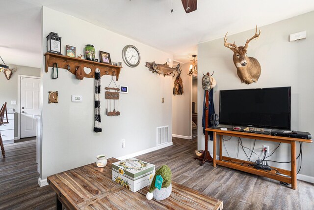 84 Eldred St, Battle Creek, MI 49015 - living room with wood finished floors, baseboards, and a ceiling fan