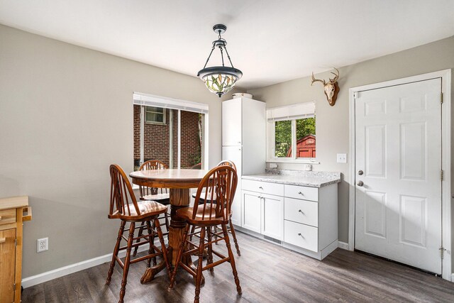 84 Eldred St, Battle Creek, MI 49015 - dining room with wood finished floors and baseboards