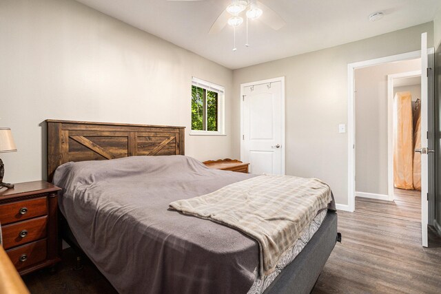 84 Eldred St, Battle Creek, MI 49015 - bedroom featuring baseboards, dark wood-type flooring, and ceiling fan