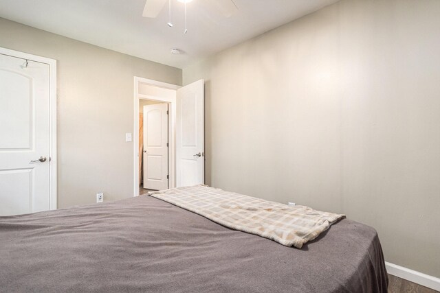 84 Eldred St, Battle Creek, MI 49015 - bedroom with baseboards, a ceiling fan, and wood finished floors