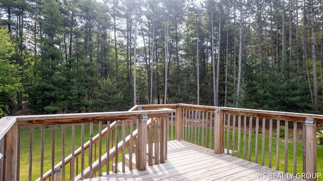 9340 Freedom Dr, West Olive, MI 49460 - wooden deck featuring a yard
