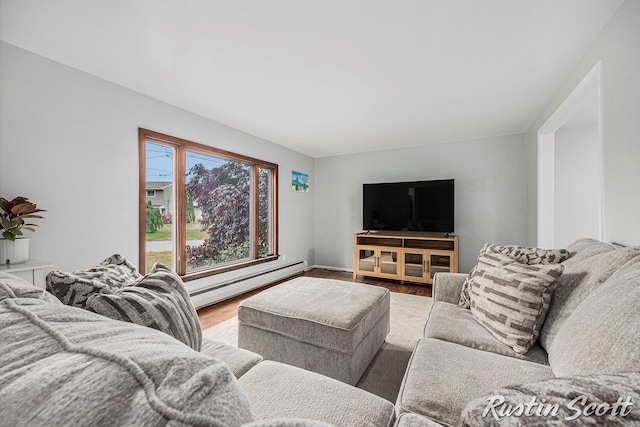 310 Brookgate Ct NW, Comstock Park, MI 49321 - living area with a baseboard heating unit and wood finished floors