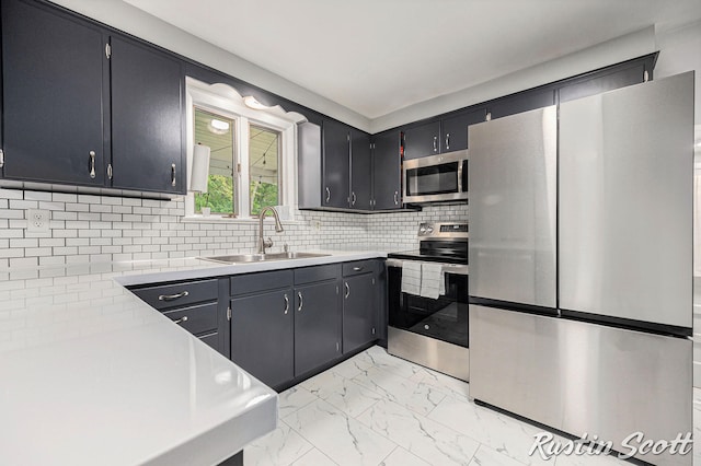 310 Brookgate Ct NW, Comstock Park, MI 49321 - kitchen with appliances with stainless steel finishes, a sink, light marble finish flooring, light countertops, and decorative backsplash