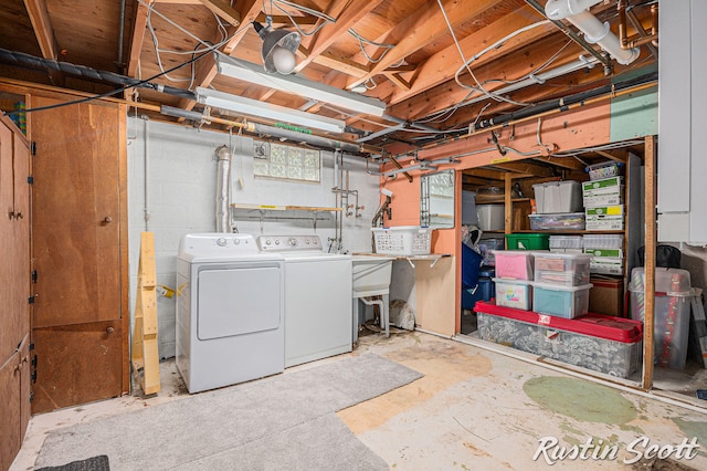 310 Brookgate Ct NW, Comstock Park, MI 49321 - below grade area with washing machine and clothes dryer