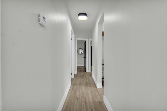 20504 Cherrylawn St, Detroit, MI 48221 - corridor featuring light wood finished floors and baseboards