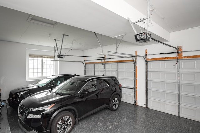 71 Knorrwood Dr, Rochester Hills, MI 48306 - garage featuring a garage door opener