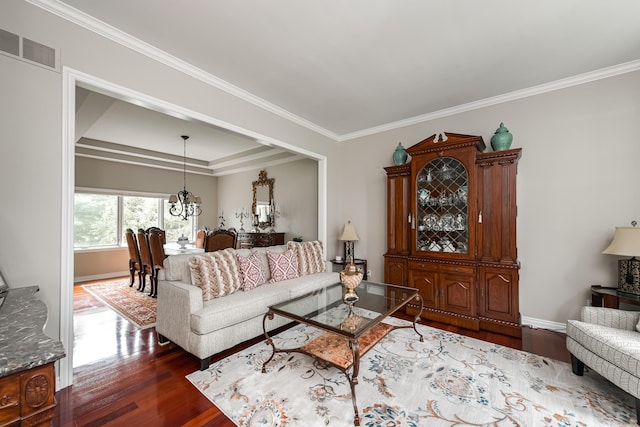 71 Knorrwood Dr, Rochester Hills, MI 48306 - living area featuring dark wood-style flooring, ornamental molding, baseboards, and a tray ceiling