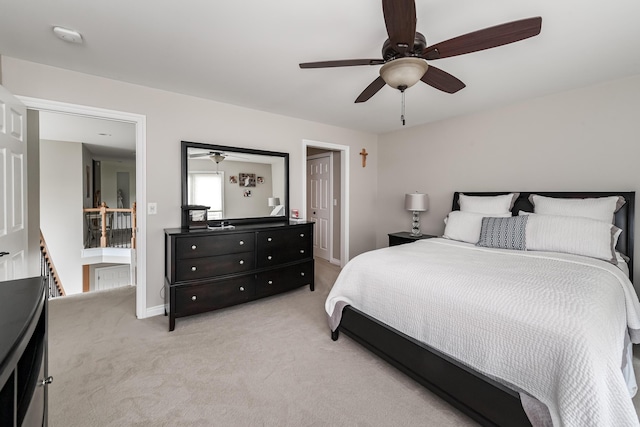 71 Knorrwood Dr, Rochester Hills, MI 48306 - bedroom with light colored carpet, ceiling fan, and baseboards