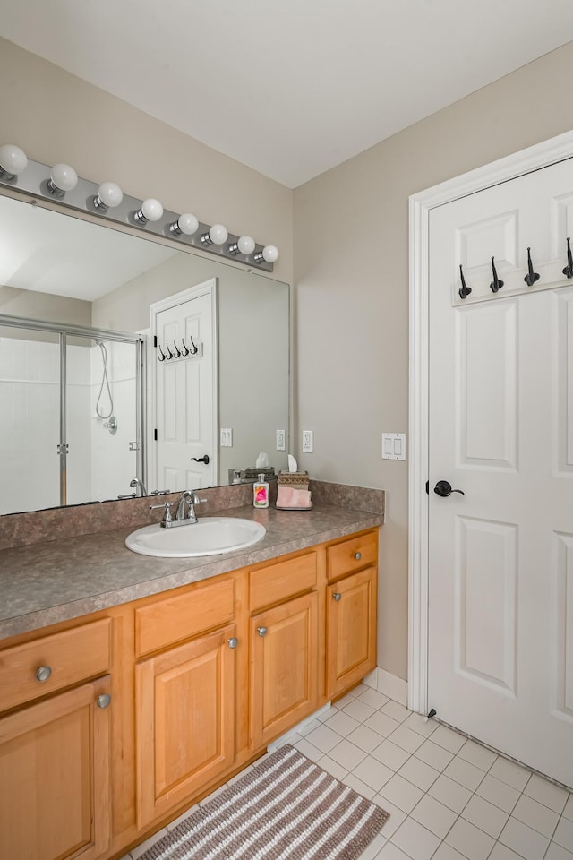 71 Knorrwood Dr, Rochester Hills, MI 48306 - bathroom featuring vanity, tile patterned flooring, and a shower stall