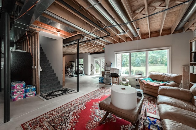 71 Knorrwood Dr, Rochester Hills, MI 48306 - living area with concrete floors and stairway