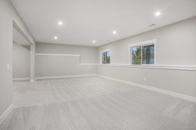 2740 Woodhaven Ct SW Unit 02, Byron Center, MI 49315 - unfurnished room featuring light carpet, recessed lighting, and baseboards