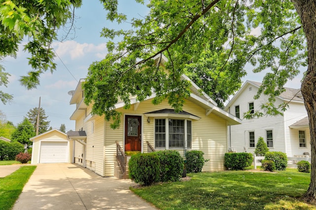 43 W Cherry Ave, Zeeland, MI 49464 - view of front facade with an outdoor structure, driveway, a front lawn, and a garage