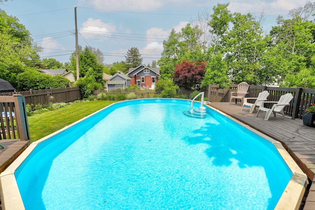 43 W Cherry Ave, Zeeland, MI 49464 - view of swimming pool with a deck