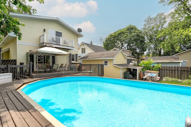 43 W Cherry Ave, Zeeland, MI 49464 - view of pool with a deck and outdoor dining area