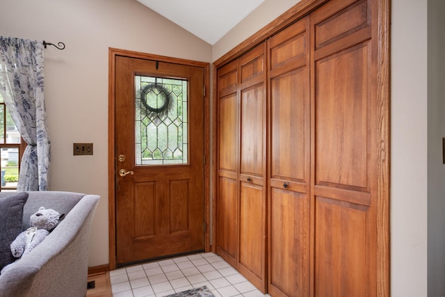 43 W Cherry Ave, Zeeland, MI 49464 - foyer featuring vaulted ceiling and light tile patterned floors