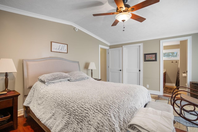43 W Cherry Ave, Zeeland, MI 49464 - bedroom with lofted ceiling, crown molding, baseboards, a ceiling fan, and ensuite bathroom
