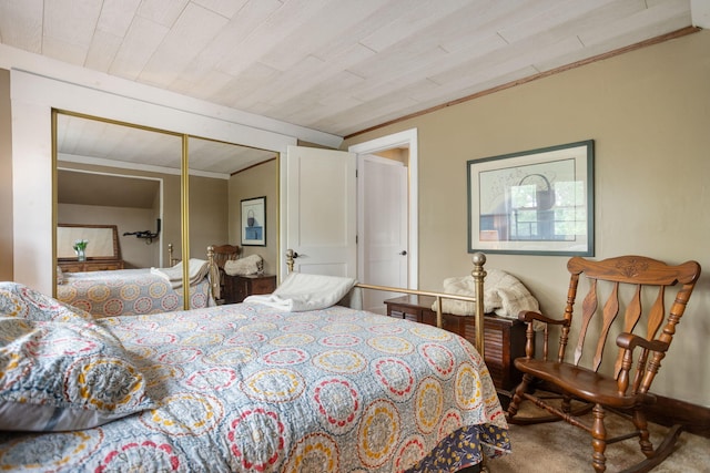 43 W Cherry Ave, Zeeland, MI 49464 - carpeted bedroom featuring ornamental molding, a closet, and wood ceiling