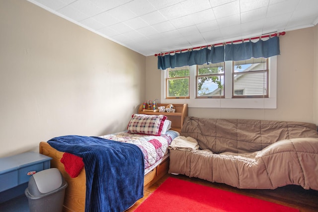 43 W Cherry Ave, Zeeland, MI 49464 - bedroom featuring wood finished floors and ornamental molding