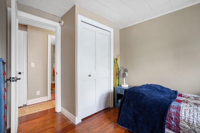 43 W Cherry Ave, Zeeland, MI 49464 - bedroom featuring wood finished floors and baseboards