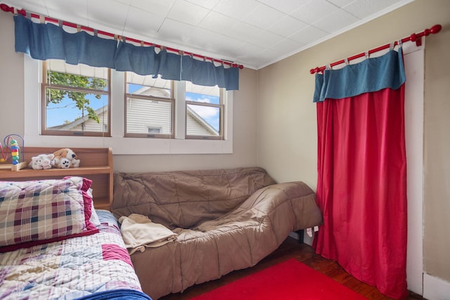 43 W Cherry Ave, Zeeland, MI 49464 - bedroom with wood finished floors and crown molding