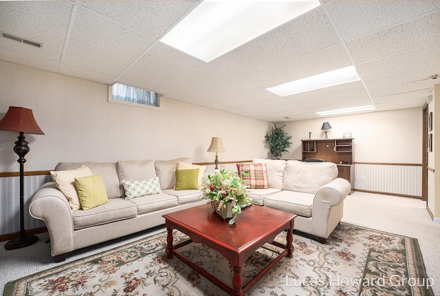 5228 Green Meadow Rd, Kalamazoo, MI 49009 - living area with a paneled ceiling, carpet, and baseboards