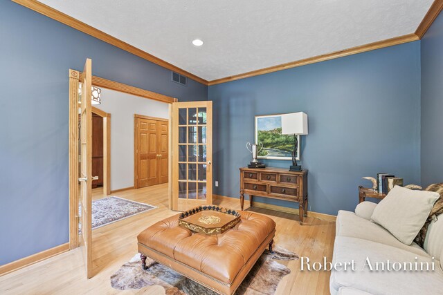 6374 Blakely Dr NE, Rockford, MI 49341 - living room with crown molding, wood finished floors, recessed lighting, and baseboards