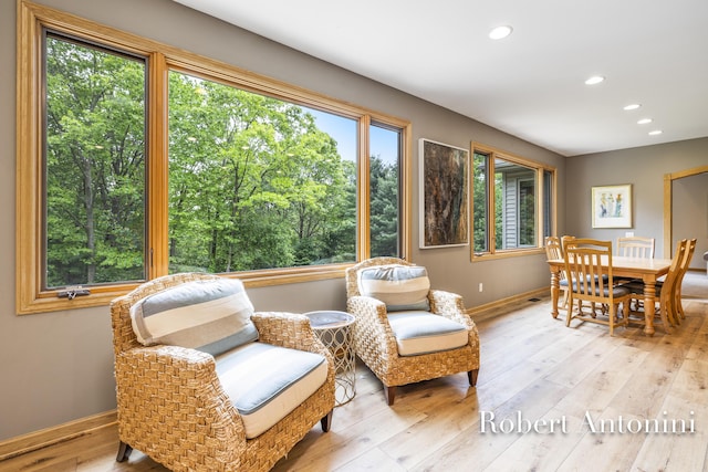 6374 Blakely Dr NE, Rockford, MI 49341 - dining area with baseboards, light wood finished floors, and recessed lighting