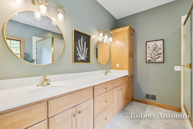 6374 Blakely Dr NE, Rockford, MI 49341 - full bath featuring double vanity, baseboards, a shower with door, and tile patterned floors