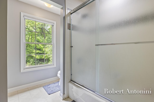 6374 Blakely Dr NE, Rockford, MI 49341 - full bath with toilet, enclosed tub / shower combo, and baseboards